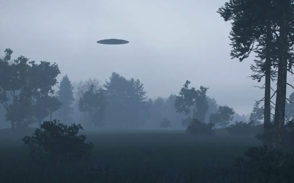 UFO hovers over a dreary landscape 